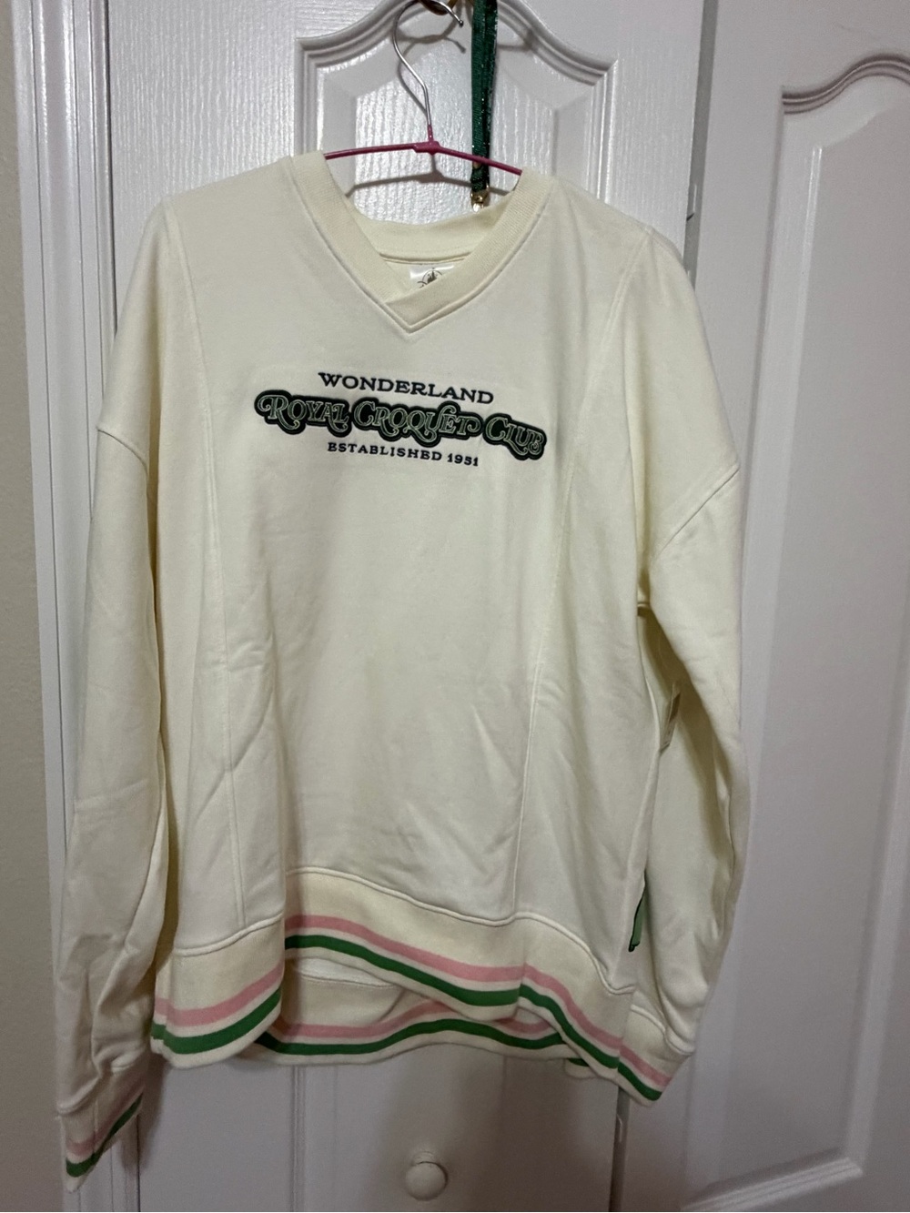 Disney Parks 2026 Alice in Wonderland 75th Anniversary white sweatshirt v neck c